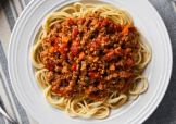 A bowl of pasta bolognese.